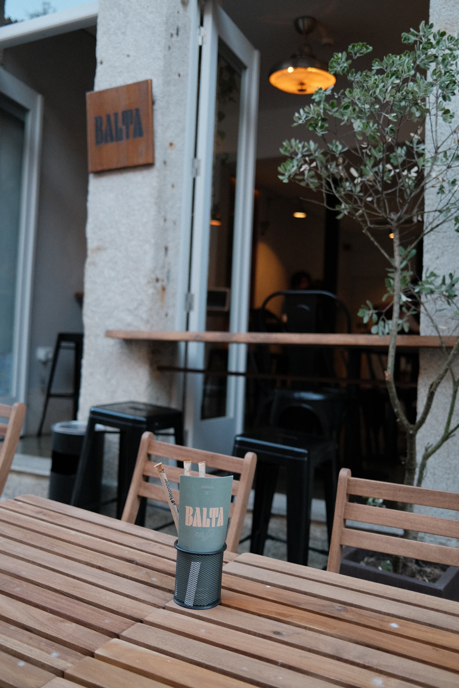 The Balta Brunch room, with the windows open to the street